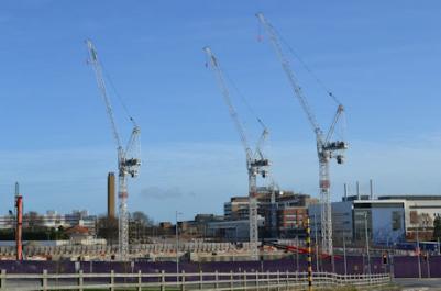 Construction work on the AstraZeneca site, from busway bridge, Cambridge Biomedical Campus, 20 December 2015.