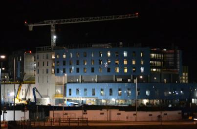 Looking from the Busway bridge towards the Cambridge Biomedical Campus at night, with Papworth Hospital. Photo: Andrew Roberts, 30 January 2017.
