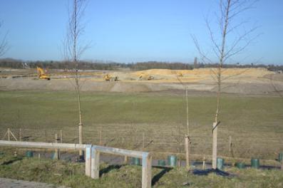 Looking across the Clay Farm green corridor with work underway to construct the lake, from the approach to the Addenbrooke’s Road bridge. Photo: Andrew Roberts, 8 February 2011.