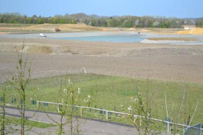 Looking from Addenbrooke’s Road over Clay Farm towards the new lake. Photo: Andrew Roberts, 9 April 2011.
