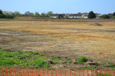 Looking across Clay Farm to Foster Road, from the footpath to Addenbrooke�s, during excavations, 10 April 2011.
