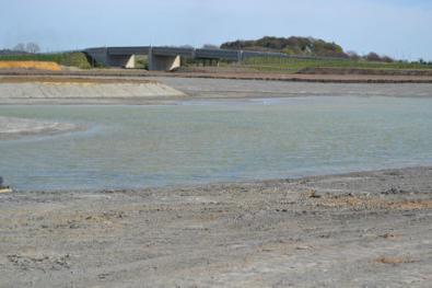 Looking across the Clay Farm lake towards the Addenbrooke’s bridge. Photo: Andrew Roberts, 10 April 2011.