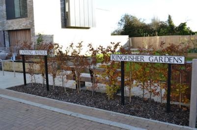 Street signs at the junction of Lapwing Avenue and Kingfisher Gardens, Seven Acres, Clay Farm, 20 November 2015.