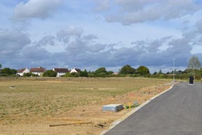 The site of the square and community centre, from the busway, Clay Farm. Photo: Andrew Roberts, 25 September 2012.
