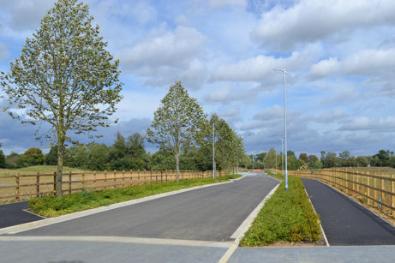 The spine road, from the path to Addenbrooke’s, Clay Farm. Photo: Andrew Roberts, 25 September 2012.