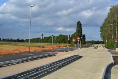 The newly constructed Clay Farm spine road junction across the Busway. Photo: Andrew Roberts, 22 July 2011.