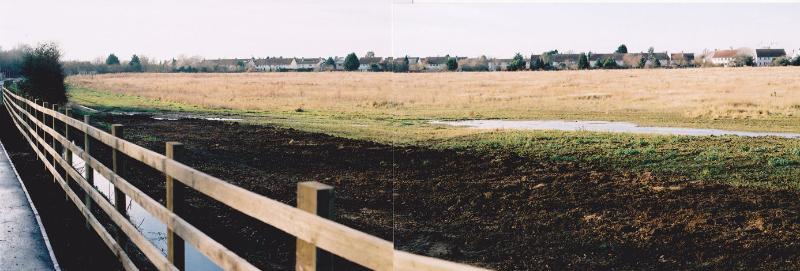 From the Guided Busway bus stop, along the line and across the Clay Farm fields to the rear of Foster Road. Photo: Andrew Roberts, 11 December 2010.