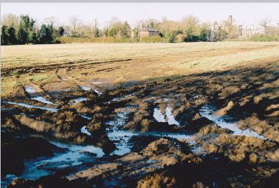 Preparation for archaeological work, looking to Wingate Way and Clay Farm House and Long Road, from the north east corner of the school site. Photo: Andrew Roberts, 9 January 2011.