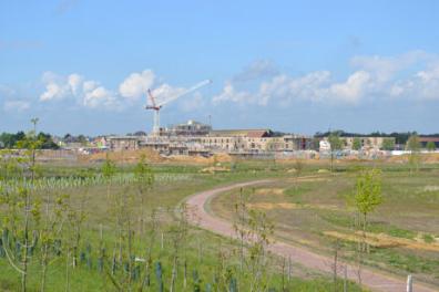 Looking from the Addenbrooke’s Road bridge to the Paragon and Abode developments, Clay Farm. Photo: Andrew Roberts, 16 May 2013.