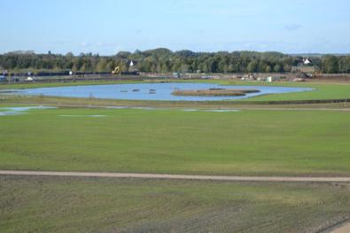 Looking across the new park from the Addenbrooke’s Road bridge, Clay Farm. Photo: Andrew Roberts, 30 October 2013.