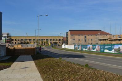 Looking along Addenbrooke’s Road from the Seven Acres development to the Abode development, Clay Farm. Photo: Andrew Roberts, 30 October 2013.