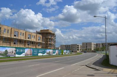 Looking along Addenbrooke�s Road with the Paragon development on the left and the Skanska area to the right, 6 May 2014.