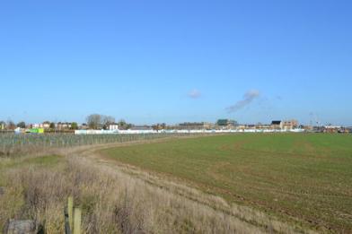 Looking from the junction of Hauxton Road and Addenbrooke’s Road along the south side of the Glebe Farm development. Photo: Andrew Roberts, 11 November 2012.
