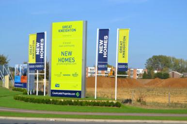 Marketing signs for housing developments at the Hauxton Road/Addenbrooke’s Road junction, Glebe Farm. Photo: Andrew Roberts, 14 October 2011.