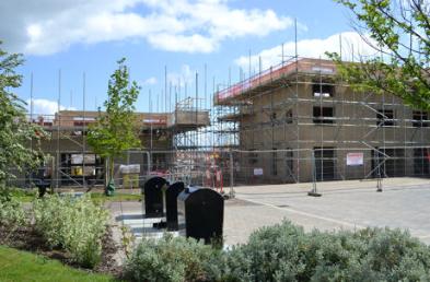 Progress with homes on Harvest Road, Novo development, 10 May 2014.