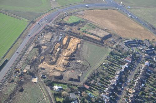 Aerial photograph of Glebe Farm from the north east, showing infrastructure work, with Addenbrooke’s Road and Hauxton Road and Bishop’s Road to the right. Source: Patrick Squire for Tamdown, 20 May 2011.