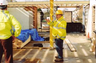 Progress with the work on the Pavilion, Oliver Smith (rear view) and Graham Bass in the main hall, 11 March 2009