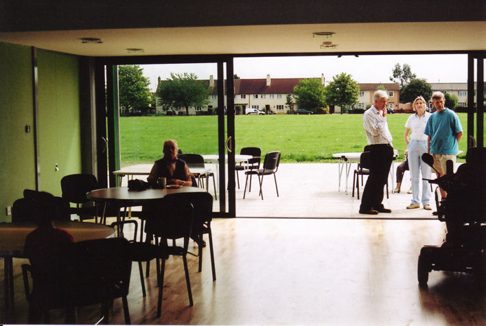 Trumpington Pavilion Open Day: looking from the hall to the patio and field, with Roger Randall in the doorway, 8 August 2009. Photo: Andrew Roberts.