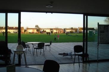 Looking out of the Pavilion to the Histon Hornets football match, at the opening of the Pavilion, 15 November 2009. Photo: Philippa Slatter. (PavilionPS17_1109)