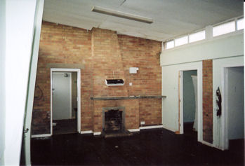 Interior of the Pavilion before renovation: main room and store, door through to changing room, June 2008