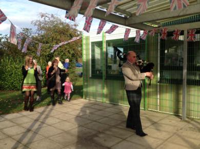 Councillor Russ McPherson playing the bagpipes, the Pavilion�s 5th birthday party. Photo: Howard Slatter, 25 October 2014.