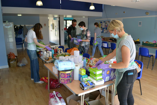 Volunteers setting up Trumpington Food Hub in Trumpington Pavilion. Photo: Andrew Roberts, 19 May 2020.