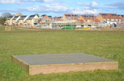 Art platform in the Country Park with new homes on Avalon Way and Otter Close, Trumpington Meadows. Photo: Andrew Roberts, 4 March 2016.