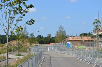 Looking north towards the church tower on the spine road within the Trumpington Meadows site. Photo: Andrew Roberts, 8 July 2013.