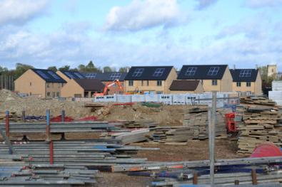 New homes near the primary school, with the church tower still visible, Trumpington Meadows. Photo: Andrew Roberts, 3 November 2013.