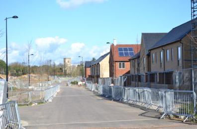 Construction progress with homes on Osprey Drive, looking from the school towards the church, Trumpington Meadows, 16 February 2014.