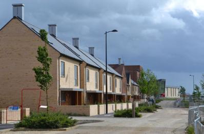 New homes along Osprey Drive, looking towards the school, Trumpington Meadows development, 10 May 2014.