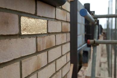 One of the golden bricks in place on a Trumpington Meadows home. Photo: Caroline Wright, April 2012.