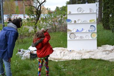 Smashing plates so that the pieces can be used in a mosaic, part of the public art project presented at a Trumpington Meadows event on 11 May 2013. Photo: Andrew Roberts.