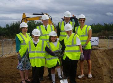Turf-cutting ceremony at the start of construction of Trumpington Meadows Primary School: teachers and children. Photo: Jenny Blackhurst, 10 September 2012.