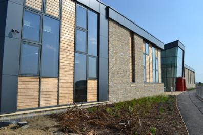 The frontage of Trumpington Meadows school, shortly after the handover from the builders. Photo: Andrew Roberts, 8 July 2013.