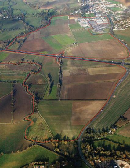 Aerial view of Trumpington Meadows from the south west, with the site outlined in red, July 2007, reproduced by permission of Grosvenor.